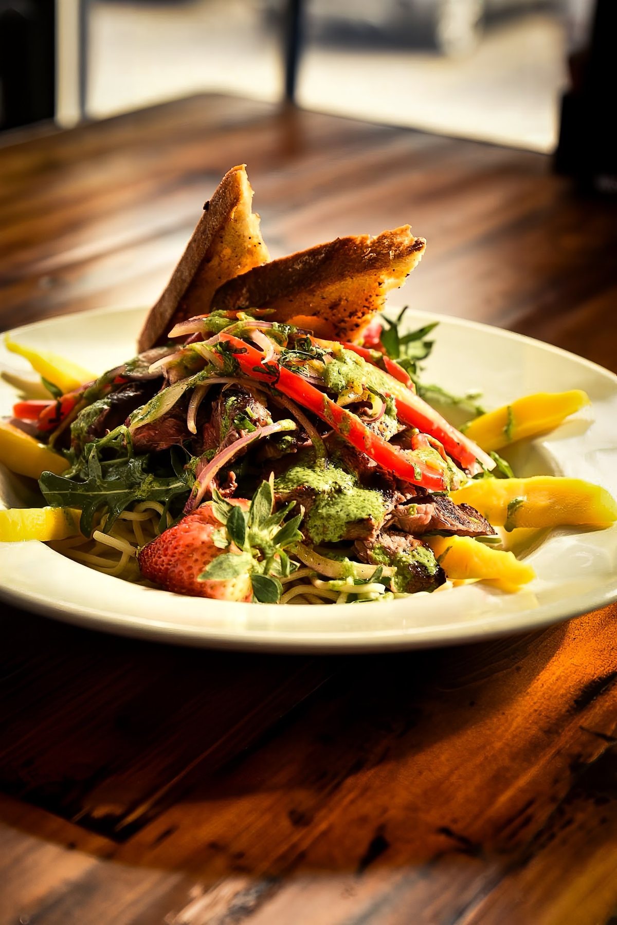 A grilled chicken salad